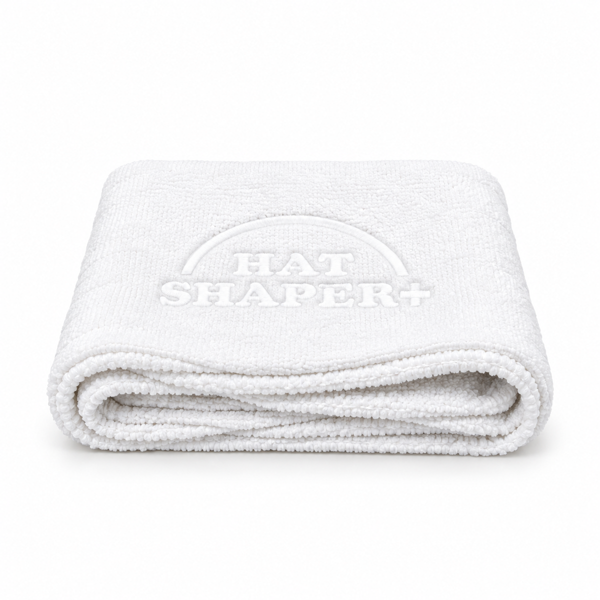 White Hat Shaper+ microfiber towel for wiping away excess dirt and cleaning foam after scrubbing baseball caps.